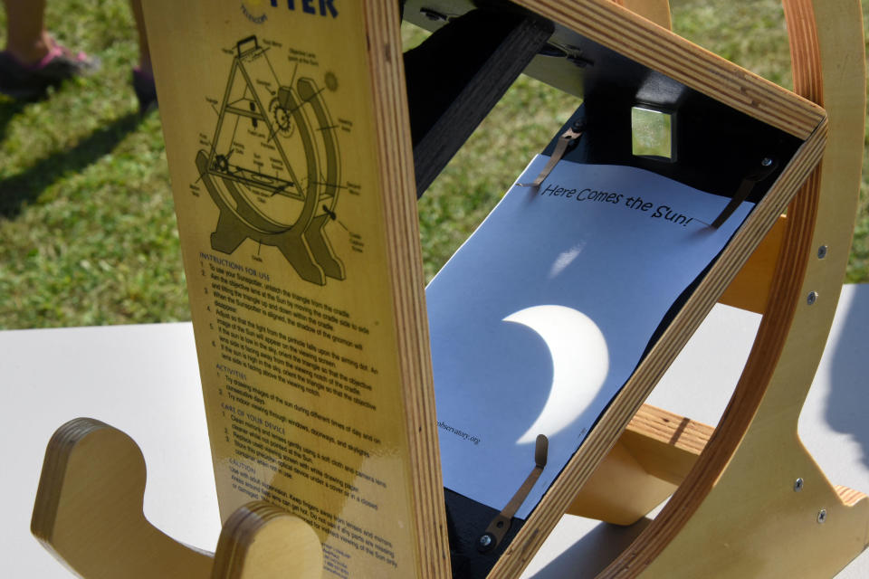 A sun spotter — a type of safe eclipse viewer — shows the eclipse at the Dudley Observatory at miSci on Monday Aug. 21, 2017 in Schenectady, N.Y. / Credit: Lori Van Buren/Albany Times Union via Getty Images