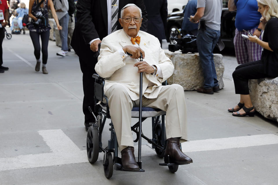 Former New York Mayor David Dinkins arrives for the funeral for former Manhattan District Attorney Robert Morgenthau at Temple Emanu-El, in New York, Thursday, July 25, 2019. (AP Photo/Richard Drew)