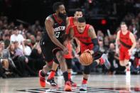 Dec 9, 2017; Portland, OR, USA; Houston Rockets guard James Harden (13) defends against Portland Trail Blazers guard Damian Lillard (0) in the second half at Moda Center. Mandatory Credit: Jaime Valdez-USA TODAY Sports