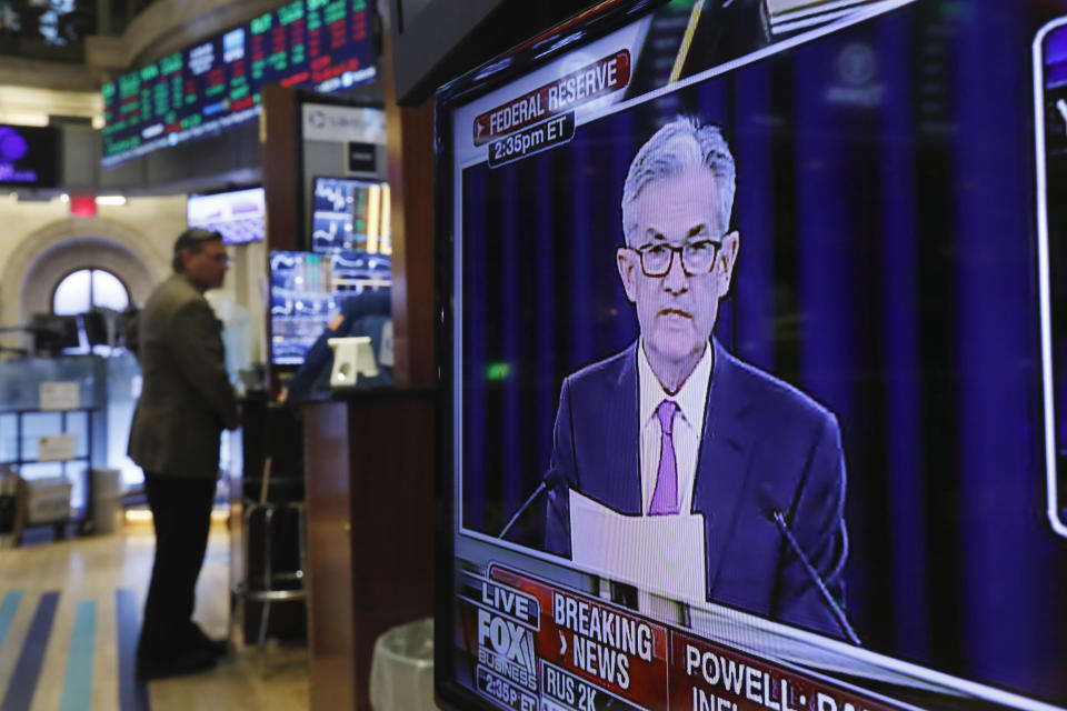 The Washington news conference of Federal Reserve Chair Jerome Powell appears on television screen on the trading floor of the New York Stock Exchange shows the rate decision of the Federal Reserve, Wednesday, June 19, 2019. (AP Photo/Richard Drew)