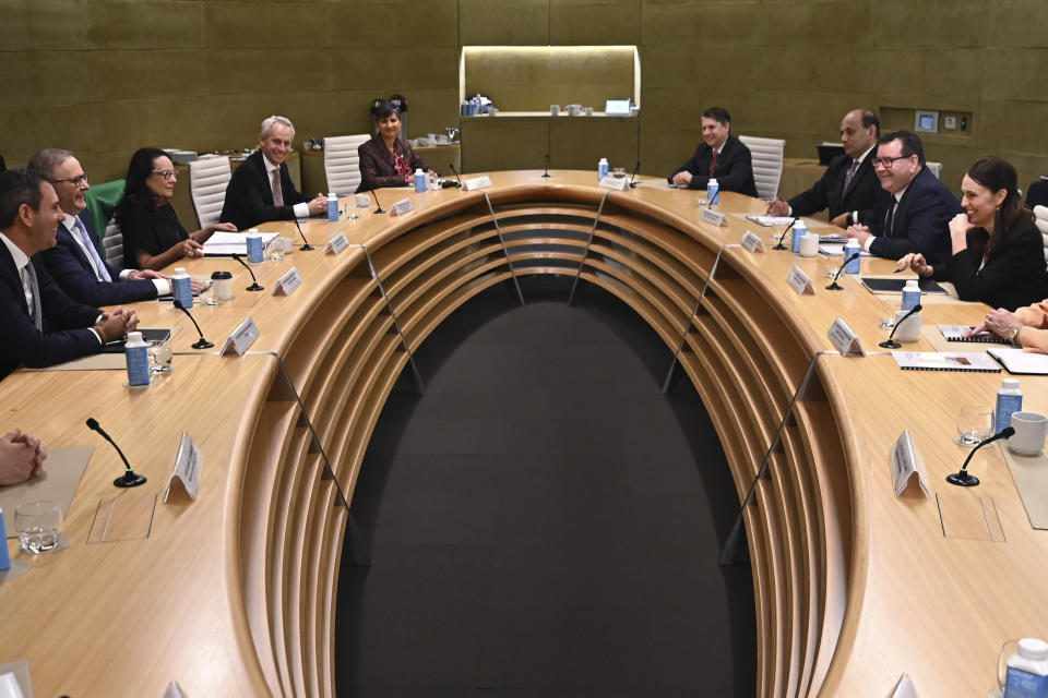 Australian Prime Minister Anthony Albanese, second left, and New Zealand Prime Minister Jacinda Ardern, right, sit at the table during the Australia-New Zealand Leaders' Meeting at the Commonwealth Parliamentary Offices in Sydney, Australia, on Friday, July 8, 2022. (Steven Saphore/Pool Photo via AP)