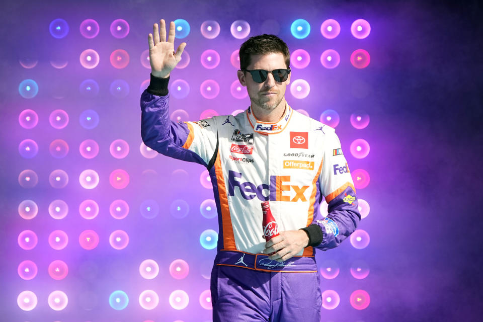 Denny Hamlin is introduced to the fans before a NASCAR Cup Series auto race on Sunday, Nov. 7, 2021, in Avondale, Ariz. (AP Photo/Rick Scuteri)