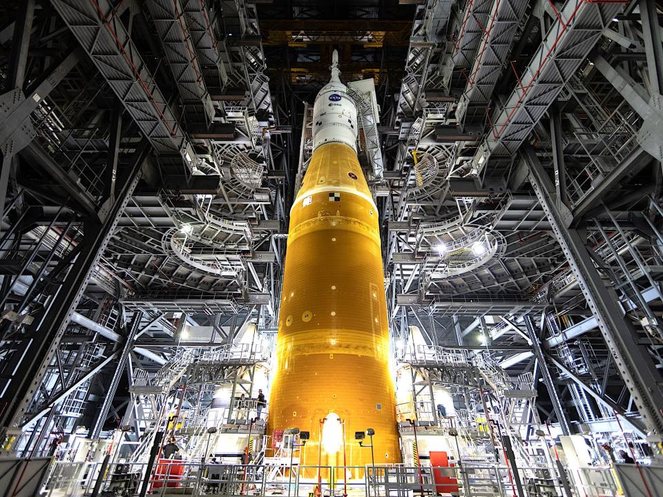 orange artemis 1 rocket inside multiplatform assembly building