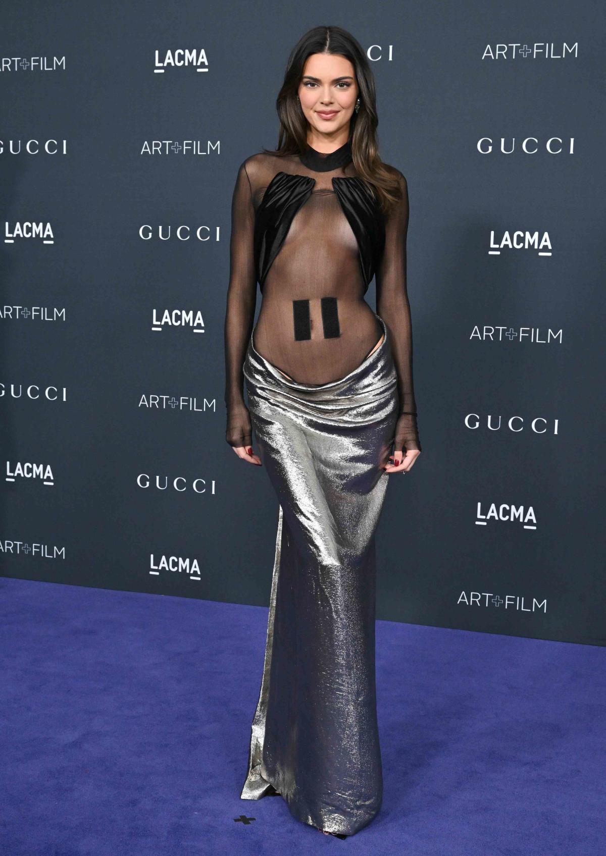 Kendall Jenner shows off slim figure & long legs in sheer body