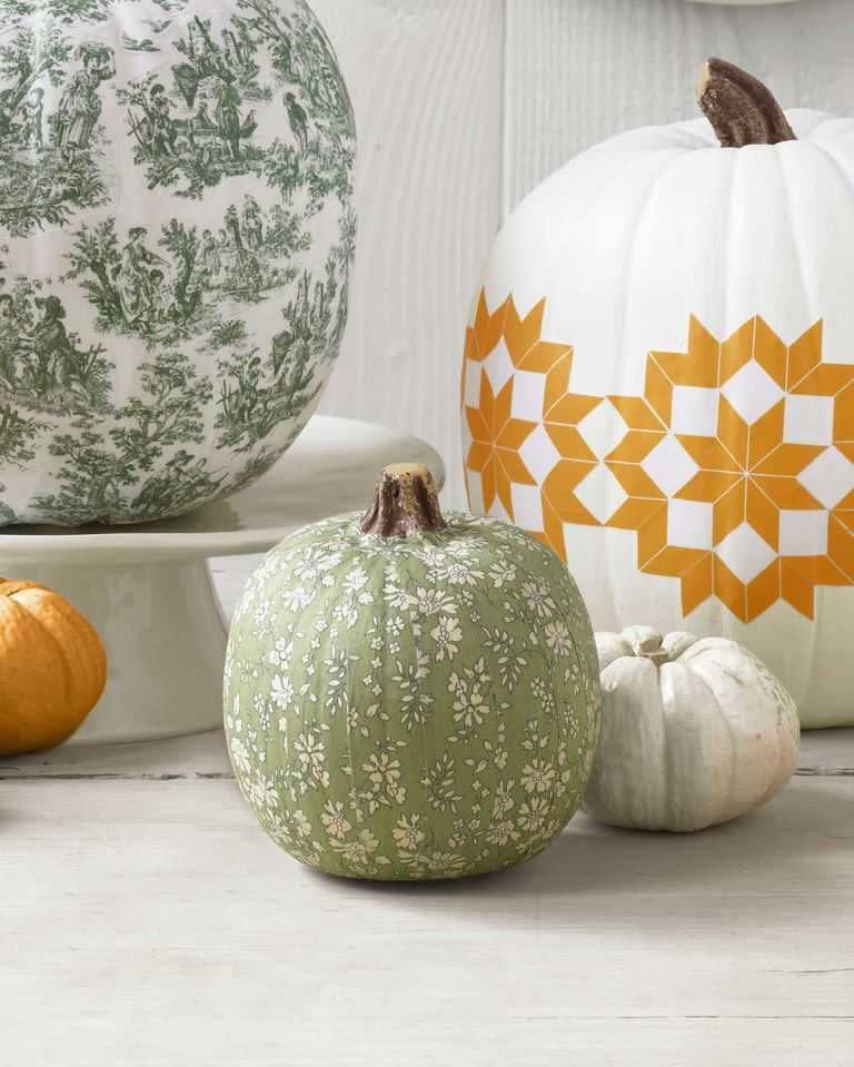 <p>Scraps of calico fabric and decoupage create these pretty country-chic pumpkins. Use faux pumpkins and keep them forever, or decorate a real one to enjoy this year.<br><br>Get the tutorial at <em><a href="https://www.countryliving.com/diy-crafts/how-to/a4177/decoupage-a-pumpkin/" rel="nofollow noopener" target="_blank" data-ylk="slk:Country Living;elm:context_link;itc:0;sec:content-canvas" class="link ">Country Living</a></em>.</p>