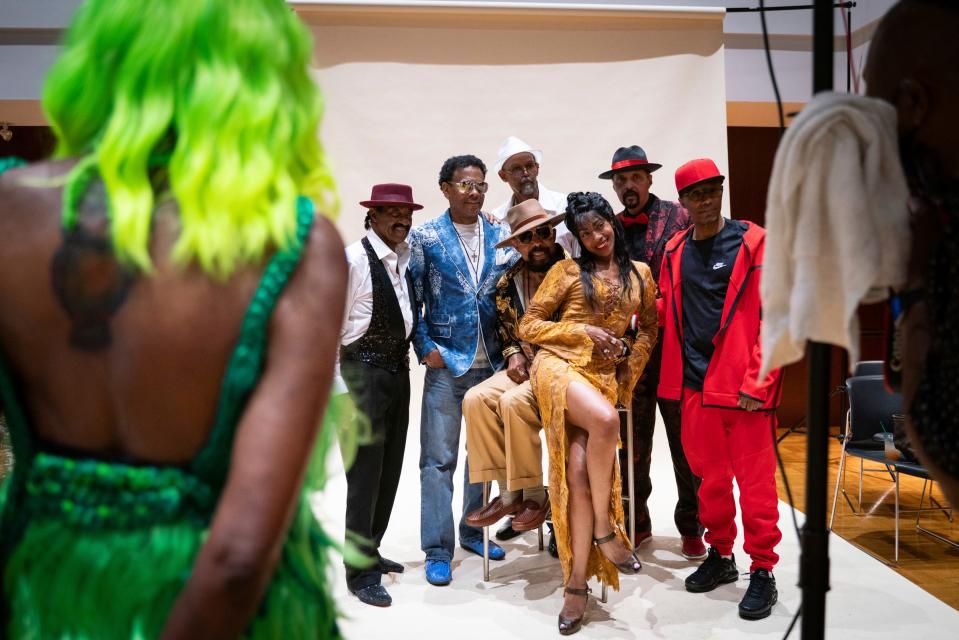 Longtime Hair Wars legends gather for a group photograph during the Hair Wars and Hot Cars runway show at Ford Community and Performing Arts Center in Dearborn on Sunday, Sept. 18, 2022.