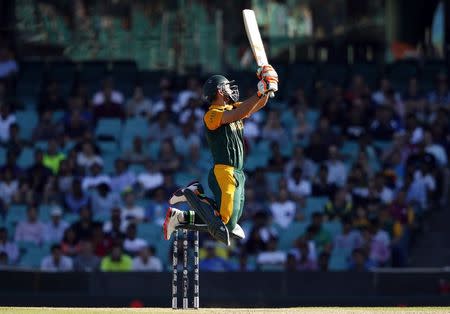 South Africa's Rilee Rossouw jumps as he hits a boundary during the Cricket World Cup match against the West Indies at the Sydney Cricket Ground (SCG) February 27, 2015. REUTERS/Jason Reed