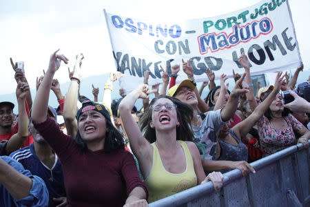 People attend a concert organised by the government of Venezuela's President Nicolas Maduro in Tienditas, Venezuela, February 22, 2019. REUTERS/Carlos Eduardo Ramirez