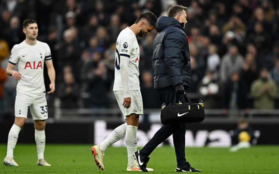 Tottenham Hotspur's Rodrigo Bentancur walks off the pitch to be substituted after sustaining an injury