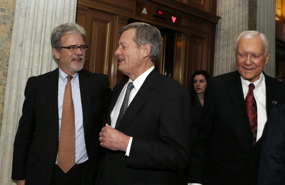 Senators Coburn, Baucus and Hatch walk into Senate chamber for budget vote on Capitol Hill in Washington