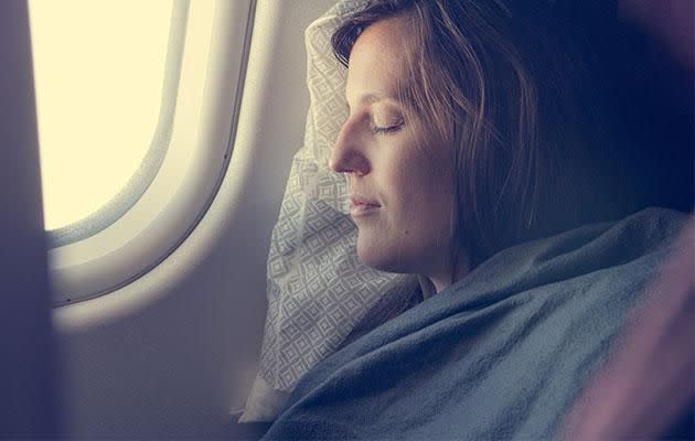 A blanket is usually the first thing passengers reach for thanks to cool cabin temperatures. Photo: Getty