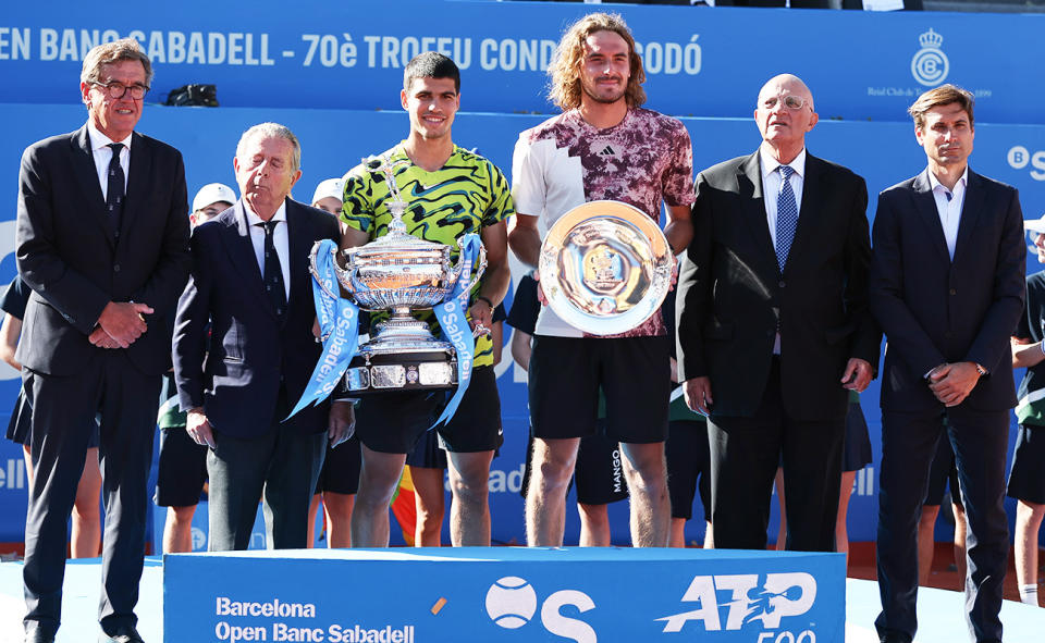 Carlos Alcaraz, pictured here celebrating with the trophy after beating Stefanos Tsitsipas in the Barcelona Open final.