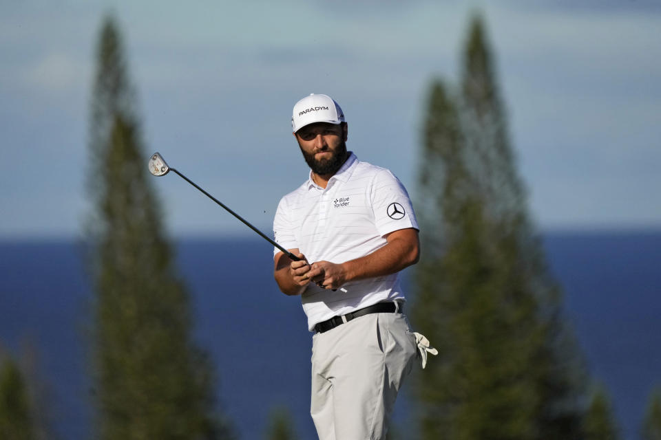 Jon Rahm, of Spain, putts on the third green during the Tournament of Champions pro-am golf event, Wednesday, Jan. 4, 2023, at Kapalua Plantation Course in Kapalua, Hawaii. (AP Photo/Matt York)