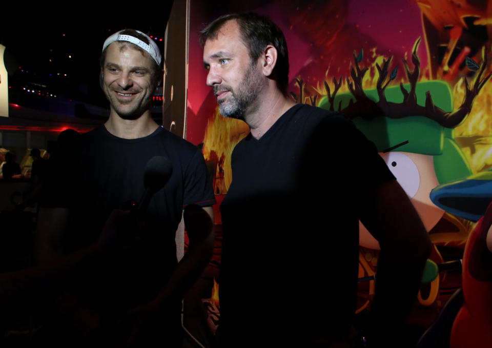 FILE - This June 12, 2013 file photo released by Ubisoft shows Matt Stone, left, and Trey Parker at the the Ubisoft booth to discuss "South Park: The Stick of Truth" at E3 in Los Angeles. (AP Photo/Ubisoft, Alexandra Wyman, file)