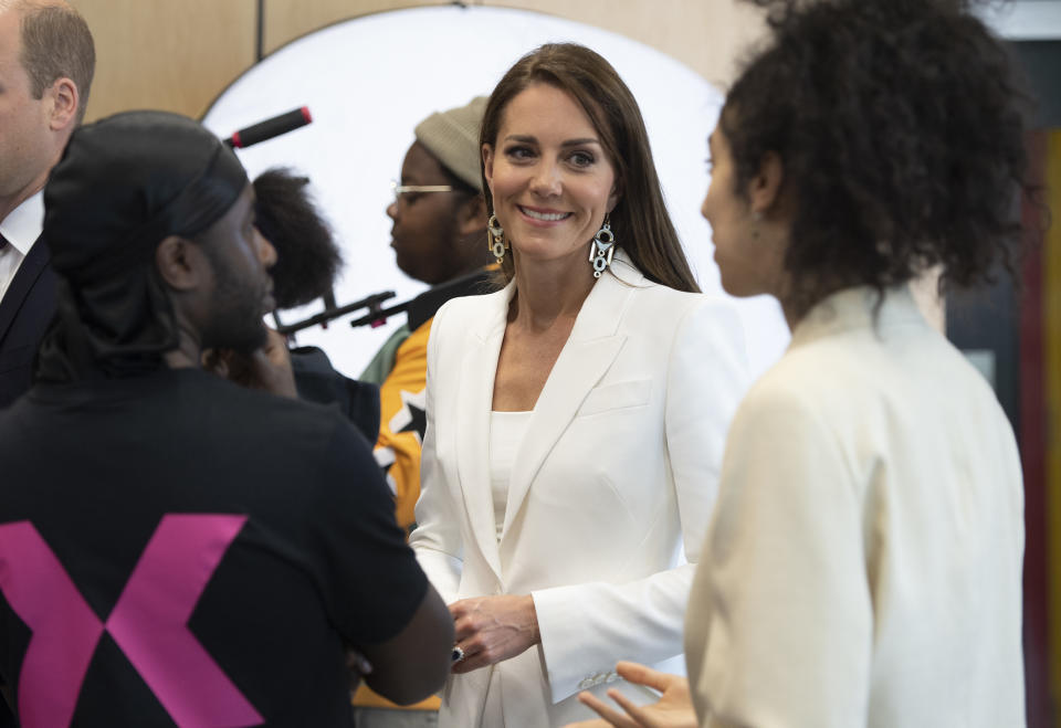 Catherine, Duchess of Cambridge speaks with participants during a visit to the ELEVATE initiative at Brixton House on June 22, 2022 in London, England