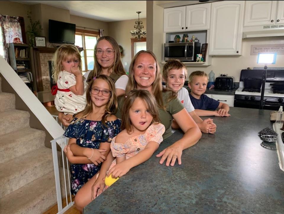 Stephanie Wiegand (center) stepped away from her nursing career to care for her and her sister's children after moving to Lead, S.D., in 2020.