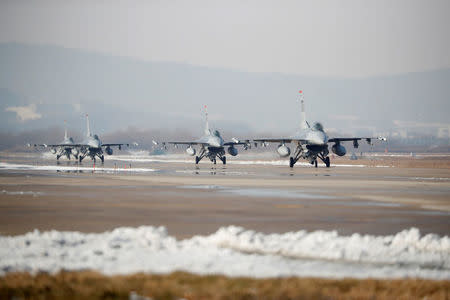 U.S. Air Force F-16 fighter jets take part in a joint aerial drill exercise called 'Vigilant Ace' between U.S. and South Korea, at the Osan Air Base in Pyeongtaek, South Korea, December 6, 2017. REUTERS/Kim Hong-Ji