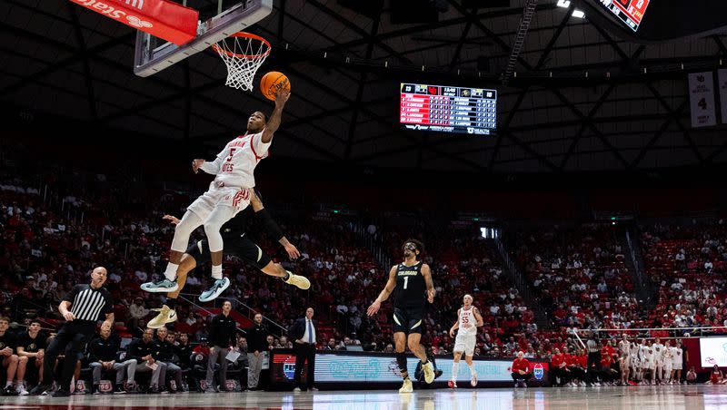 Utah Runnin’ Utes guard Deivon Smith shoots during a game against Colorado at the Jon M. Huntsman Center in Salt Lake City on Saturday, Feb. 3, 2024. The Georgia Tech tranfer has come up big since starting guard Rollie Worster went down with an injury.