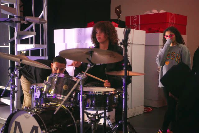 <p>Mariah Carey/Youtube</p> Mariah Carey's son practices on the drums.