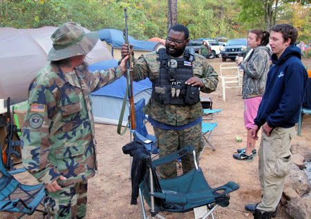 Members of the III% Security Force militia gather for a field training exercise in Jackson, Georgia, U.S. October 29, 2016. REUTERS/Justin Mitchell