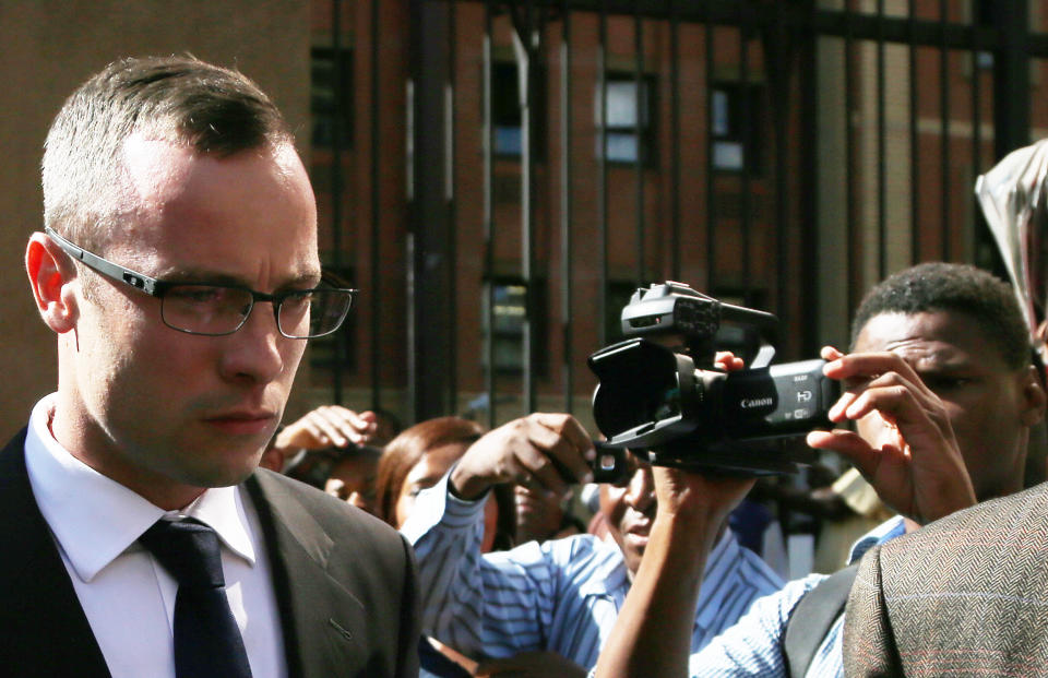 Oscar Pistorius leaves the high court in Pretoria, South Africa, Monday, March 24, 2014. Pistorius is charged with murder for the death of his girlfriend, Reeva Steenkamp, on Valentines Day in 2013. (AP Photo/Themba Hadebe)