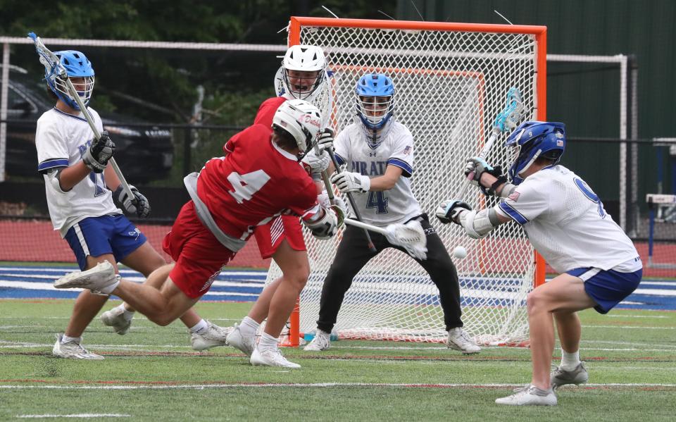 Sean Berrigan (4) scores a goal during a 16-11 loss at Pearl River in a Section 1 Class C quarterfinal on May 22, 2023.