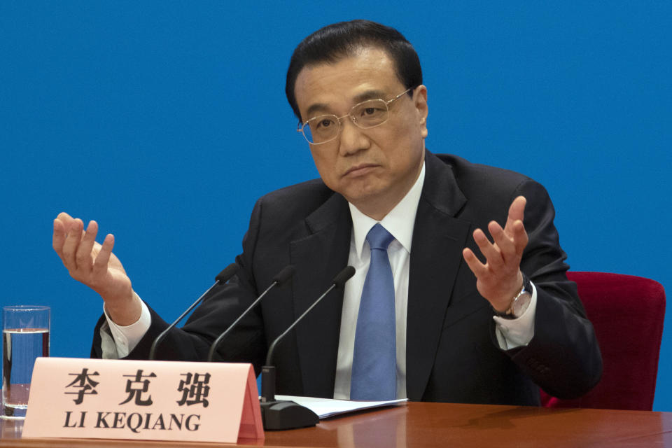 Chinese Premier Li Keqiang speaks during a press conference after the closing session of the National People's Congress in Beijing's Great Hall of the People on Friday, March 15, 2019. (AP Photo/Ng Han Guan)