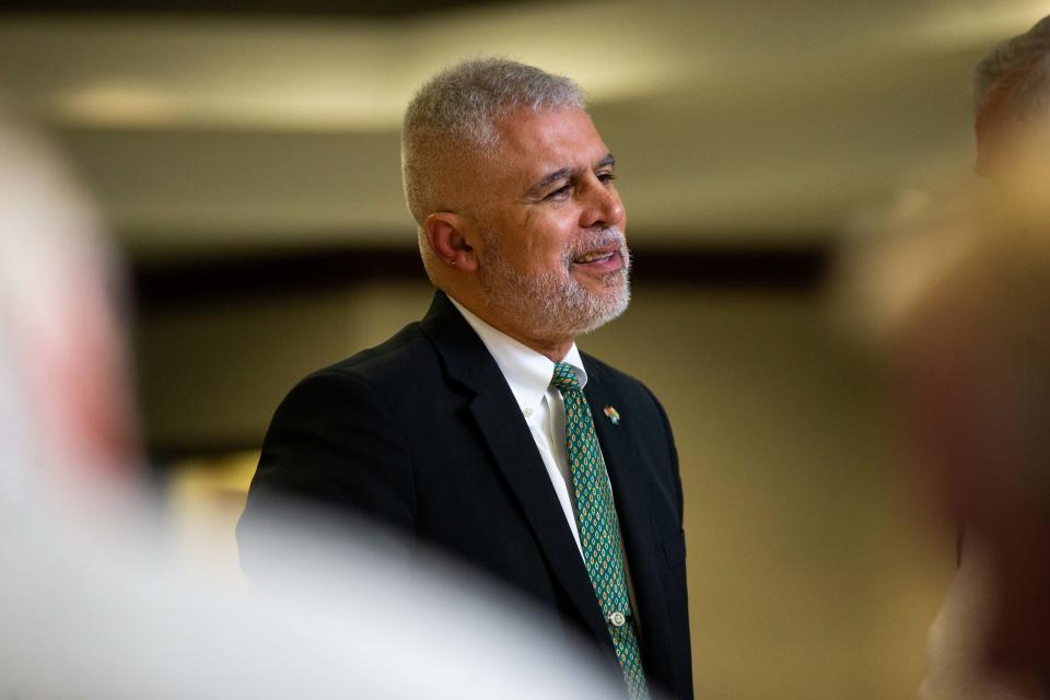 Legal Counsel Jack Jordan talks with members of the public during a short break in the board's meeting Tuesday, March 14, 2023, in West Olive. 