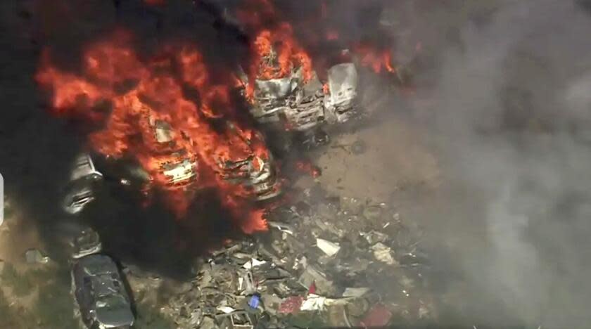 A two-alarm blaze erupted at an auto recycling center in the Antelope Valley on July 25, 2024. (KTLA)