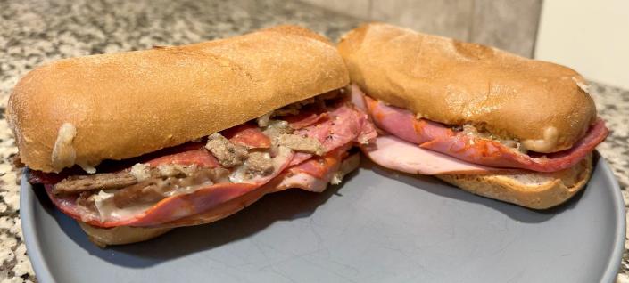 Visitors to Aroma Pizza can find a variety of gluten-free options for their diets. This sandwich, a gluten-free version of &quot;The Carnivore,&quot; can be customized for each customer's dietary needs.