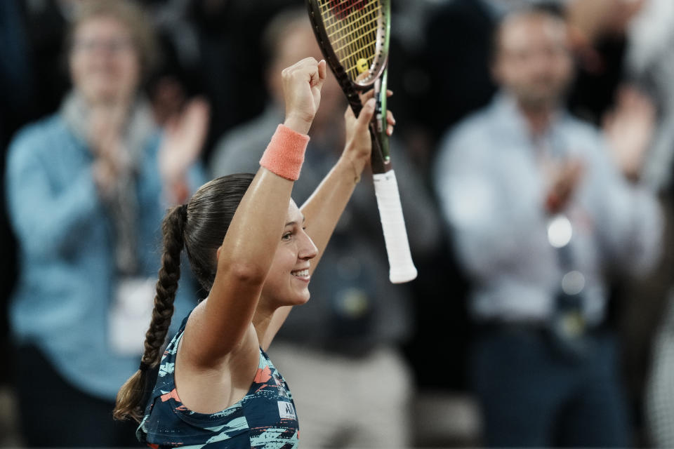 France's Diane Parry celebrates her win over Barbora Krejcikova of the Czech Republic in three sets, 1-6, 6-2, 6-3, during their first round match at the French Open tennis tournament in Roland Garros stadium in Paris, France, Monday, May 23, 2022. (AP Photo/Thibault Camus)