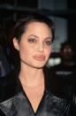 <p>During the 90, Angelina rocked really short hair – so #EDGY. [Photo: Getty] </p>