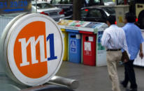 M1 stays in the third spot in terms of corporate reputation. Competitive rates offered by the telcos was one of the top factors that helped to boost a telco's reputation. M1 was the first to offer Singapore's first WiFi roaming service in Apr 2013. (AFP file photo)