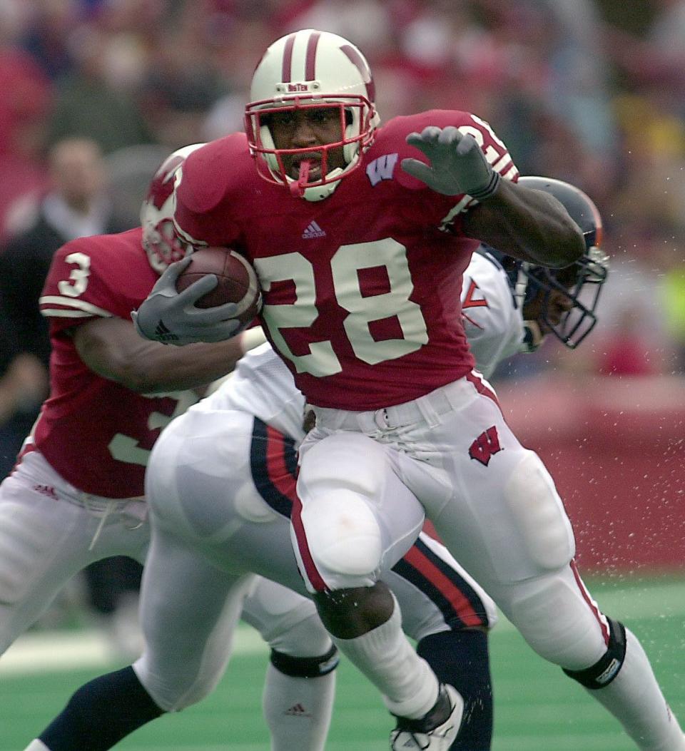 Anthony Davis holds the UW record with five rushing touchdowns scored in a 301-yard performance against Minnesota in 2002.