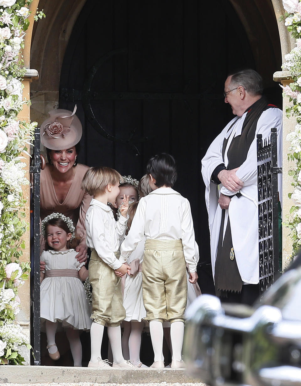 Kate and the children wait for Pippa to walk into the church
