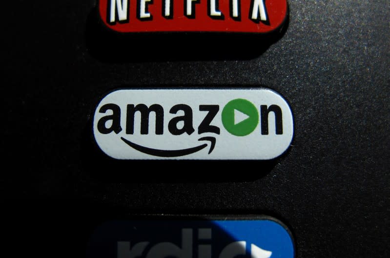 The Amazon TV button on a remote control is shown in this photo illustration