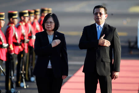 Taiwan's President Tsai Ing-wen stands with El Salvador's Foreign Minister Hugo Martinez after her arrival at the Oscar Arnulfo Romero International Airport in San Luis Talpa, El Salvador January 12, 2017. REUTERS/Jose Cabezas