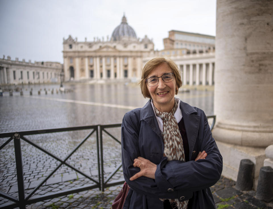 Italian journalist Giovanna Chirri poses for a portrait at the end of an interview with The Associated Press at the Vatican, Thursday, April 29, 2021. Giovanna Chirri who was covering a routine ceremony by Pope Benedict XVI on Feb. 11, 2013, never expected what unfolded, or that her high school Latin would give her the scoop of a lifetime. Giovanna Chirri of the authoritative ANSA news agency was in a Vatican press room watching the event on closed-circuit TV when Benedict said calmly and in Latin that he would be retiring because he believed he was too old for the job. (AP Photo/Domenico Stinellis)