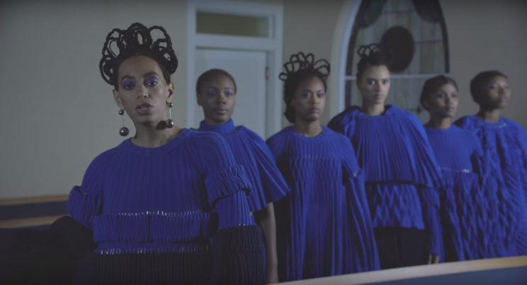 This African-inspired 'do has to be the most epic in the video. (Photo: Columbia Records)