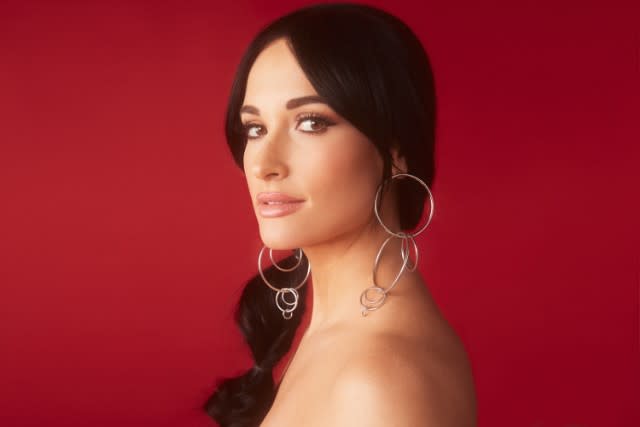 On a dreary afternoon in late March, Kacey Musgraves pulls up to a Walgreens in the town of Sioux City, which sits at the intersection of South Dakota, Nebraska, and Iowa, tucked just inside the border of the latter. She’s here supporting country behemoths Little Big Town on a tour that is approaching the end of a run…