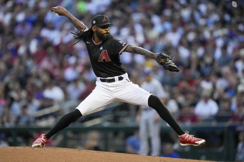 Arizona Diamondbacks relief pitcher Miguel Castro throws against the Texas Rangers.