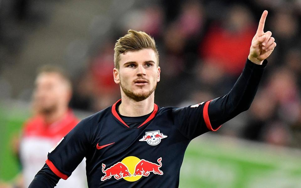  Timo Werner celebrates after scoring a penalty during their German Bundesliga soccer match against Fortuna Duesseldorf  - Martin Meissner/AP