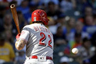 Cincinnati Reds' Derek Dietrich is hit by a pitch during the fifth inning of a baseball game against the Milwaukee Brewers, Saturday, June 22, 2019, in Milwaukee. (AP Photo/Aaron Gash)