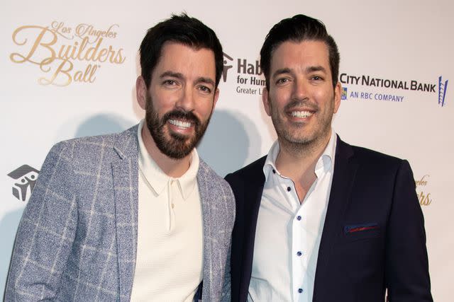 <p>Ella Hovsepian/Getty </p> Drew Scott (left) and Jonathan Scott photographed in Los Angeles on March 8, 2023