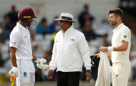 Cricket - England vs West Indies - Second Test - Leeds, Britain - August 29, 2017 England's James Anderson and West Indies' Kieran Powell talk Action Images via Reuters/Lee Smith