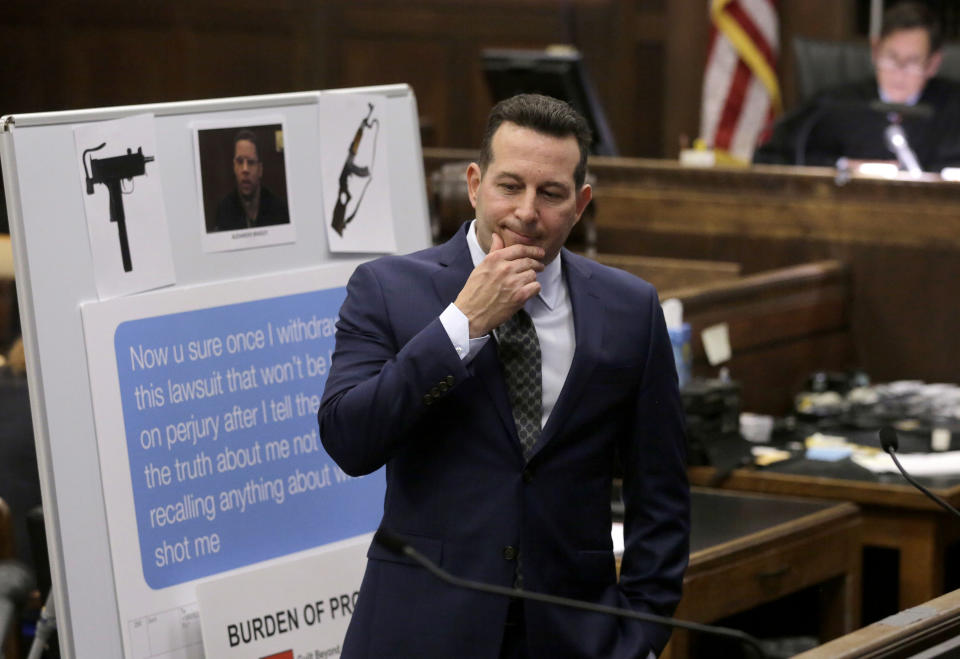 Defense attorney Jose Baez presents closing arguments in the trial of former New England Patriots tight end Aaron Hernandez, at Suffolk Superior Court, Thursday, April 6, 2017, in Boston. Hernandez is on trial for the July 2012 killings of Daniel de Abreu and Safiro Furtado who he encountered in a Boston nightclub. The former NFL player is already serving a life sentence in the 2013 killing of semi-professional football player Odin Lloyd. (AP Photo/Steven Senne, Pool)