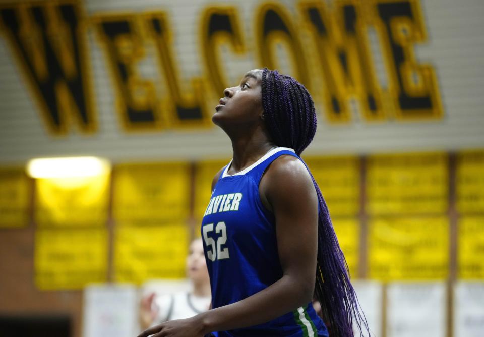 Xavier Prep center Irene Noelle Guiamatsia (52) watches a free throw against Gilbert during a game at Gilbert High School in Gilbert, Ariz., on Jan. 9, 2024.