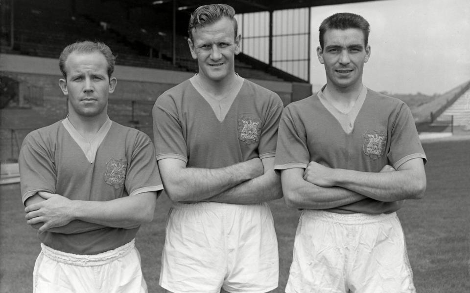 Bell in 1960 with his Leeds teammates Eric Smith, left, and Don Revie, who would soon become manager at Elland Road - Colorsport/Shutterstock