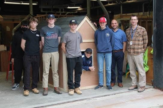 (Left to right) SCVTHS students Armando Garcia of Bridgewater, Tyler Lozier of Manville, Vincent Puleio of Belle Mead, William Rogus of Branchburg, Josiah Gonzalez of Hillsborough, Steven LaRosa of Bridgewater, Supervisor of Career and Technical Education Rob Carrig and SCVTHS Carpentry Instructor James Foley pose for a photo after the completion of the playhouse.