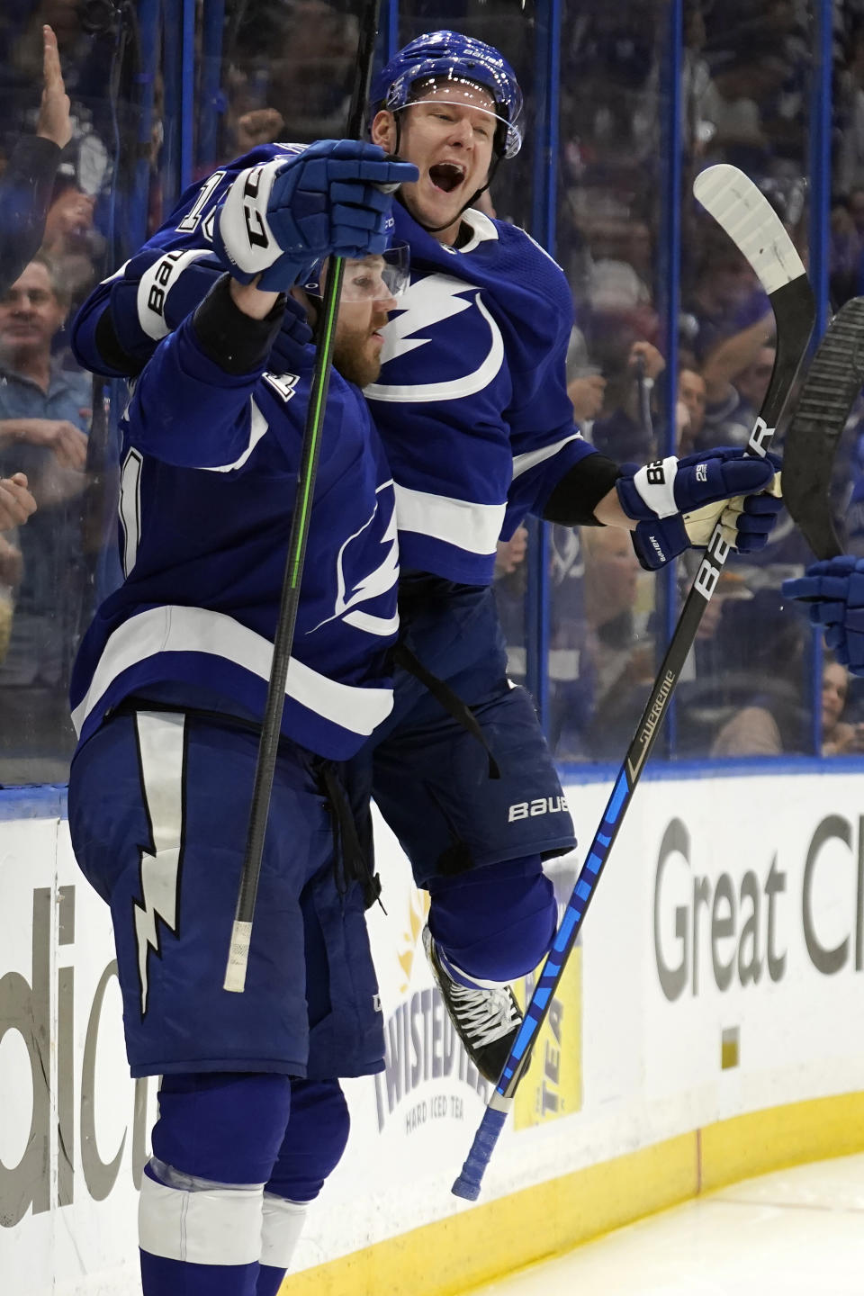 Tampa Bay Lightning defenseman Erik Cernak, left, celebrates his goal against the Florida Panthers with left wing Ondrej Palat (18) during the second period in Game 3 of an NHL hockey second-round playoff series Sunday, May 22, 2022, in Tampa, Fla. (AP Photo/Chris O'Meara)